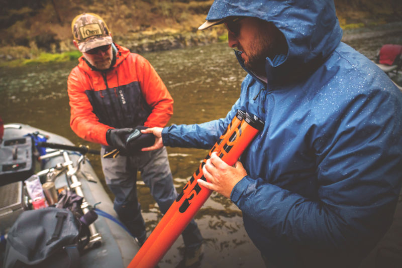 Two anglers prep their gear before they hit the water.