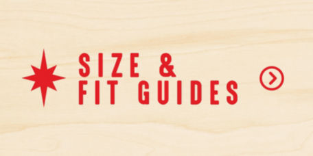 Size & Fit Guides in red letters on a wooden background.