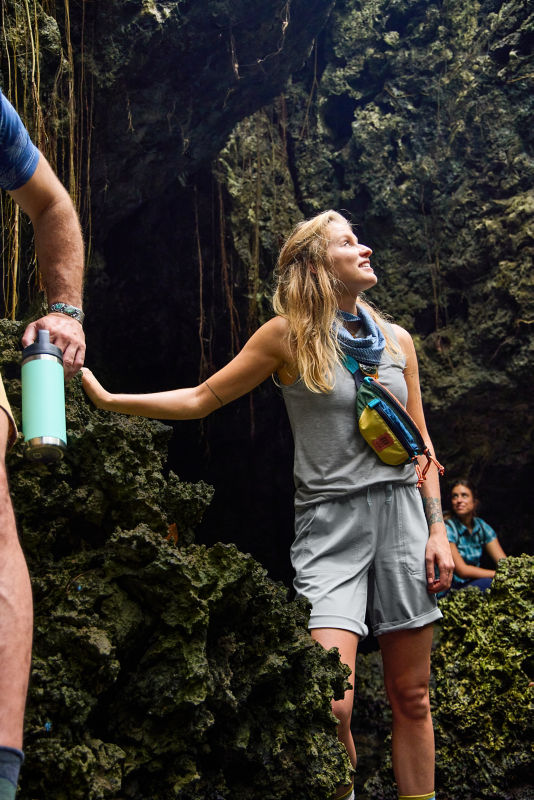 Woman hiking the caves in Honduras