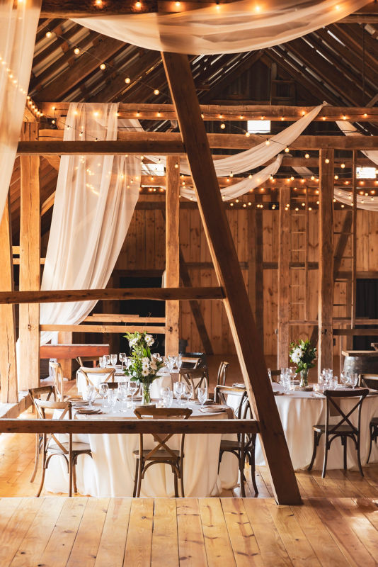 A stunning barn decorated for a wedding.