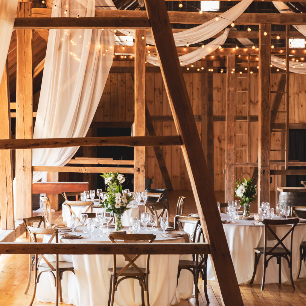 A stunning barn decorated for a wedding.