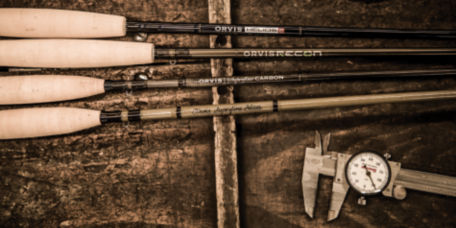 Fly rods and tools on a workbench
