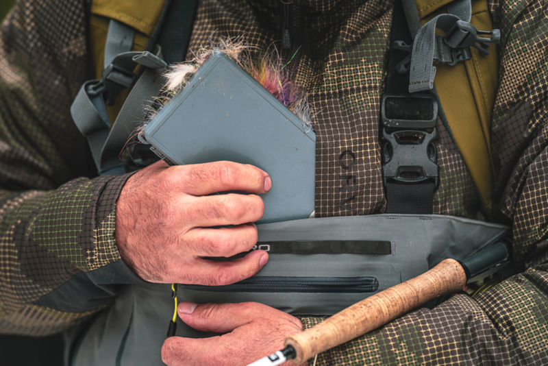 Detail image of a zippered security pocket in a camo PRO jacket