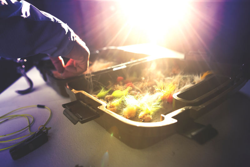 A close-up of a filled fly box.