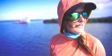 Becca Skinner wearing sunglasses and a PRO Sun hoodie.