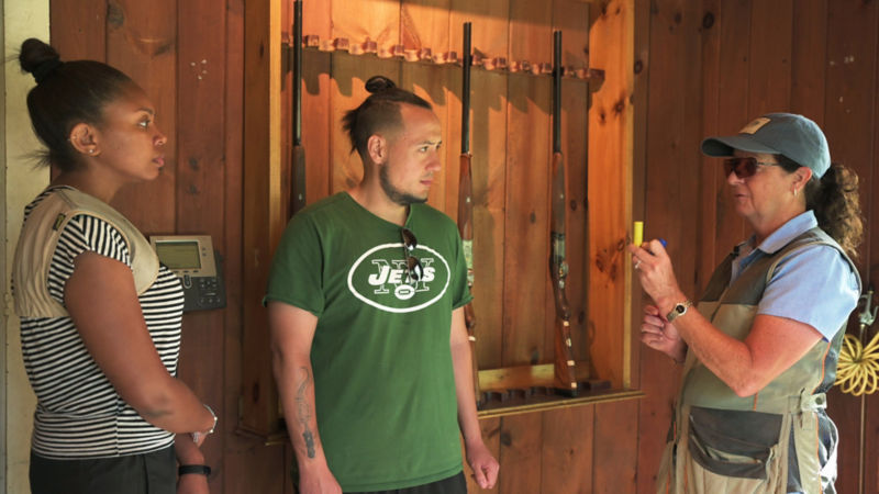 Paula talking to a customer at Sandanona.