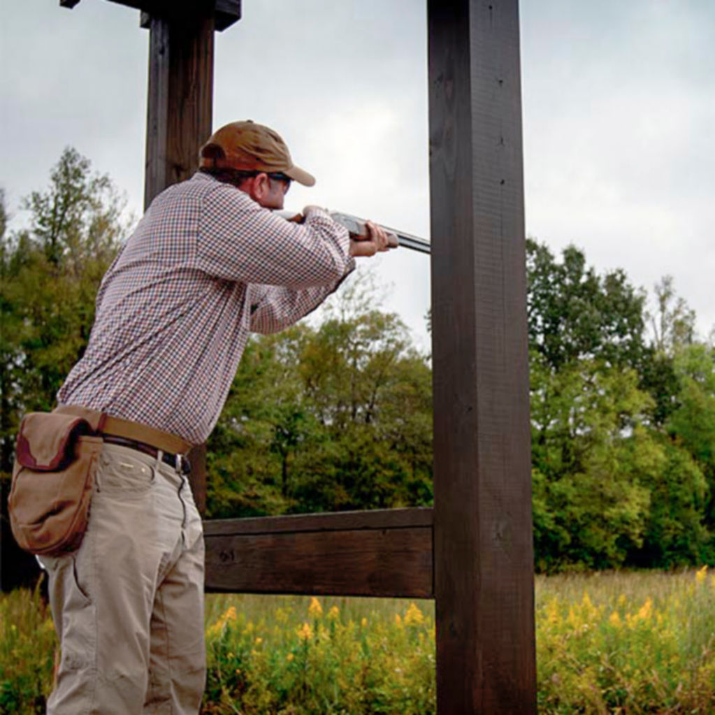 A hunter shoots from a shooting stands