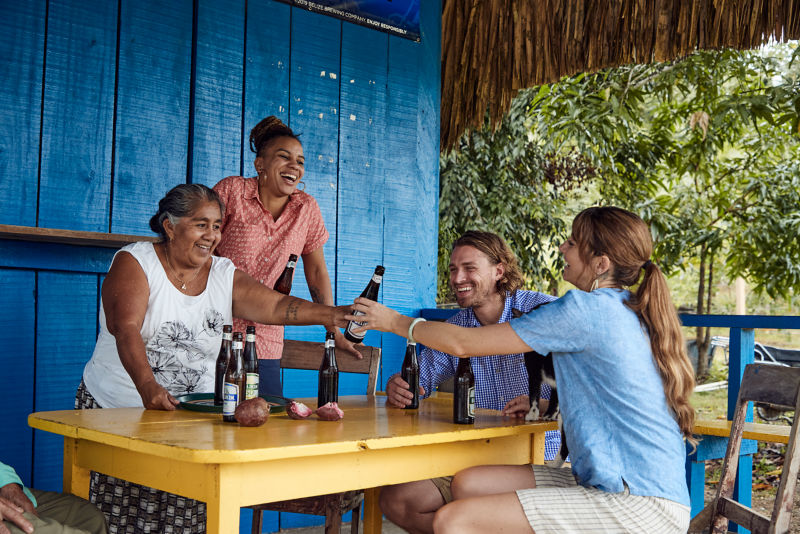 Tourists enjoying a roadside bar in Belize.