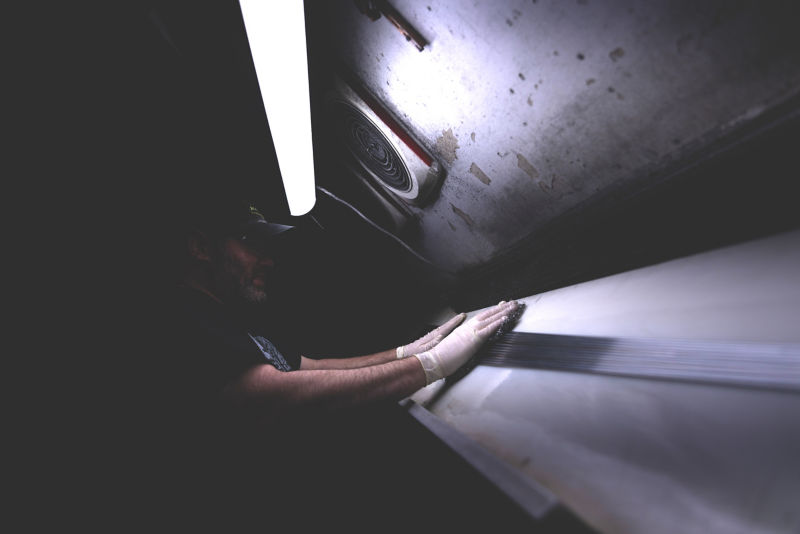 A rod shop builder working on a new fly rod.