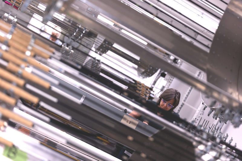 A rod shop builder at work.