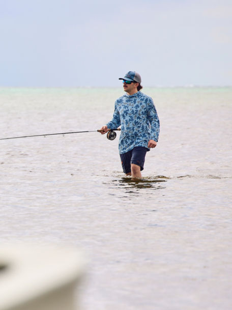 Man fishes in the ocean