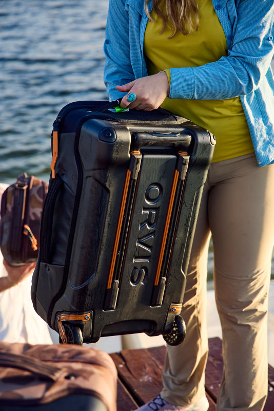 A close up of durable, black, Orvis luggage