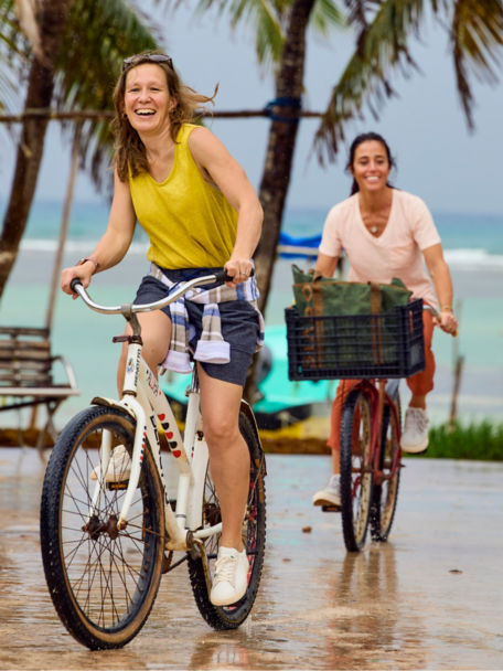 Woman riding bike wearing linen shorts