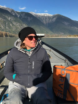 Sandra Rossi in a boat on a mountain lake