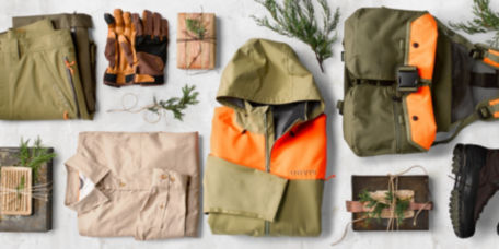 An arrangement of hunting products – boots, gloves, shirt, vest, jacket