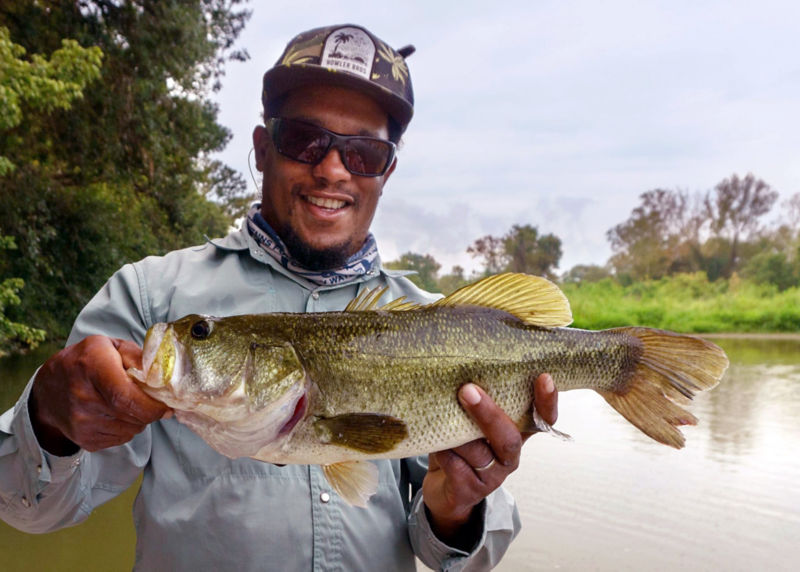 Man holding a Guadelupe bass