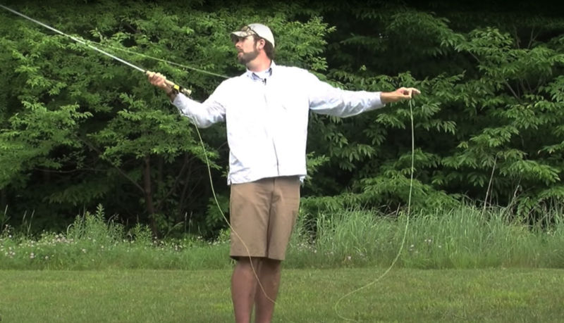 An instructor demonstrating a cast