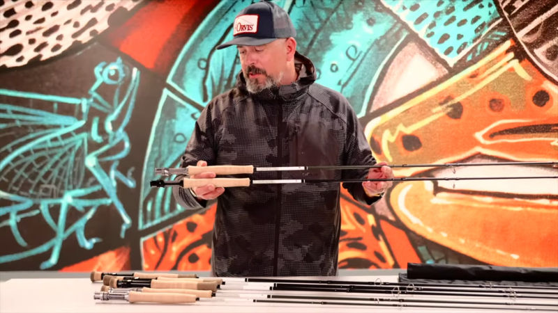 Shawn Combs holds Helios F and D rods. image number 6