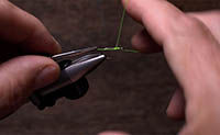 https://assets.orvis.com/is/image/orvisprd/olc_images_fly_tying_tips_how_to_hand_whipfinish