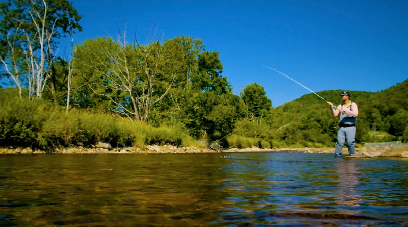 Pete Kutzer teachs a fishing lesson in a Vermont stream.