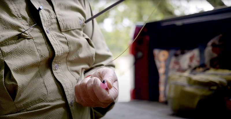 A close-up of a hand holding an indicator